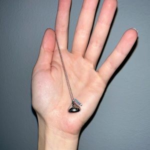 Real diamond sterling silver kiss necklace